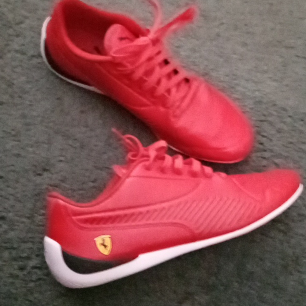 Woman's red Puma sneakers size 9